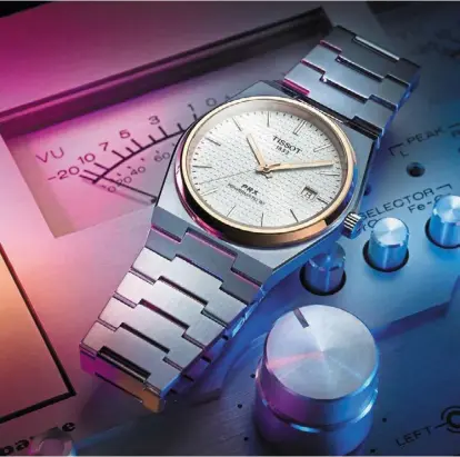  ??  ?? a throwback to the 1970s, tissot’s upgraded prx automatic reintroduc­es a sophistica­ted and youngat-heart piece with on-trend retro-aesthetics.