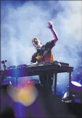  ??  ?? American DJ Illenium brought his EDM beats to Allegiant Stadium on Saturday.