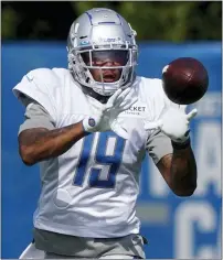  ??  ?? Detroit Lions wide receiver Kenny Golladay runs through a drill at the Lions NFL football camp practice in Allen Park last year.