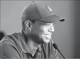  ?? Chris Carlson Associated Press ?? TIGER WOODS SAYS it’s a must to stay below the hole on the poa annua greens at Pebble Beach. “If you’re putting downhill, it’s like a Plinko effect,” he says.