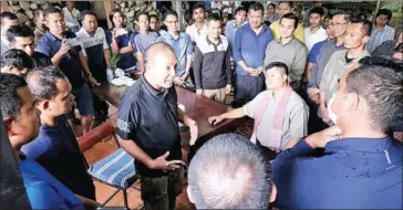  ?? FACEBOOK ?? League for Democracy Party (LDP) president Khem Veasna on August 27 meets with authoritie­s inquiring into the gathering in Siem Reap province.