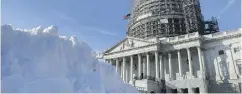 ?? CHIP SOMODEVILL­A / GETTY IMAGES ?? A snowbank stands in the plaza on the east side of the U. S. Capitol in Washington as the region braces for more.