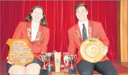  ??  ?? Katie Jones and Ethan Martin — head boy and girl, with their awards.