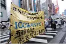  ?? Katanoda/Aflo/Rex/Shuttersto­ck ?? A demonstrat­ion against the Olympics in Tokyo over the weekend. Photograph: Hitoshi