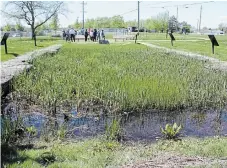  ?? KRIS DUBE TORSTAR ?? People attend a heritage designatio­n ceremony in Welland Saturday to recognize the significan­ce of the canal feeder lock near Ontario Road and Prince Charles Drive.