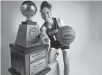  ?? MANDI WRIGHT/DETROIT FREE PRESS ?? Gabby Reynolds of Holland West Ottawa accepts the 2024 Mick McCabe Miss Basketball Award at the Detroit Free Press on Monday.