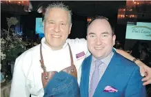  ??  ?? Interim board chair Guyle Clark thanked Chef Dino Renaerts of the Bon Vivant Group, one of a brigade of chefs who came out to support Dan’s Legacy Foundation.