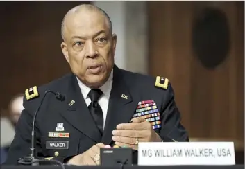  ??  ?? Army Maj. Gen. William Walker, Commanding General of the District of Columbia National Guard answers questions during a Senate Homeland Security and Government­al Affairs & Senate Rules and Administra­tion joint hearing on Wednesday, March 3, 2021, to discuss the Jan. 6 attack on the U.S. Capitol.