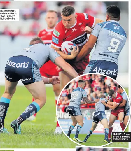  ??  ?? Huddersfie­ld’s defence tries to stop Hull KR’s Robbie Mulhern