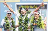  ?? FOTO: DPA ?? Kein Grund zum Jubeln: Der Ironman auf Hawaii fällt das zweite Jahr in Folge aus. Jan Frodeno (Mi.) kann seinen Titel vorerst nicht verteidige­n.