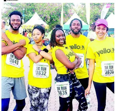  ?? FILE ?? Members of Team Yello are all smiles after completing their 5K run at last year’s Kingston City Run.