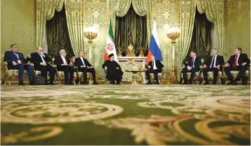  ?? (Sputnik/Pavel Bednyakov/Kremlin via Reuters) ?? RUSSIAN PRESIDENT Vladimir Putin and Iranian President Ebrahim Raisi meet in December 2023. Moscow remains a significan­t diplomatic and military ally of Iran.
