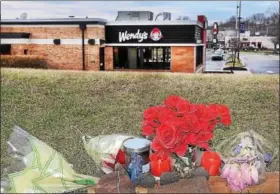  ??  ?? A memorial for Donnie Purnell is set up along Route 100 at the scene where he was killed in a hit-and-run crash March 3. The scene is right next to the Wendy’s restaurant where Donnie was on his way to work.