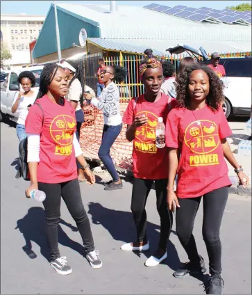  ?? Photo: Aletta Shikololo ?? Political tinge… Some of the students were seen wearing T-shirts of the upcoming political party ‘POWER’,founded by Namibian entreprene­ur Michael Amushelelo.