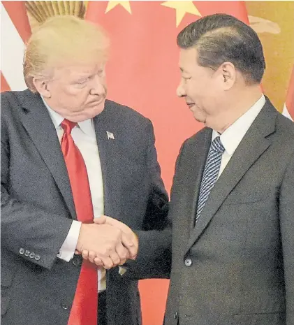  ?? AFP ?? Encuentro. La foto se produjo durante la cumbre que ambos líderes celebraron en noviembre en Beijing.