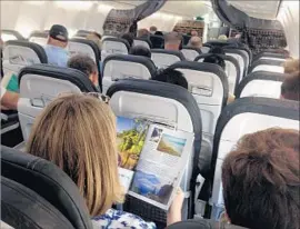  ?? Mark Boster Los Angeles Times ?? FLYERSRIGH­TS.ORG asked the FAA in 2015 to consider standards to prevent airlines from further reducing legroom and seat width. The request was denied.