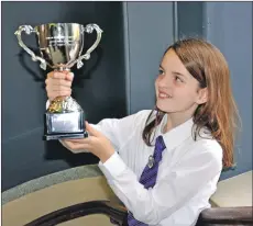  ?? 17_MOD42DM02_Tuesday ?? Isabella Sommervill­e from Inverness won the Marybury Gardens Cup for the fluent girls’ under-11 singing competitio­n.