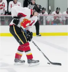  ?? Stuart Gradon/Calgary Herald ?? Rookie Sam Bennett, seen here at scrimmage on Wednesday, will be competing for a job with the Calgary Flames when training camp opens in September. Bennett has yet to sign a contract.