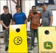  ?? Courtesy ?? Participat­ing in the cornhole tournament at the Gates Community Center, Inc. fund raiser are, from left, Gates Community Center Cornhole Tournament Reserve Champion team Quentin and Brent Myers and Champion team members Bereket and Adam Glendy.