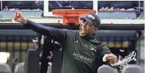  ?? TIM NWACHUKWU/ GETTY IMAGES ?? Head coach Kenny Blakeney celebrates after leading Howard past Norfolk State to win the MEAC Men’s Basketball Tournament.