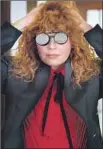  ?? Netf lix ?? DEATH dogs Natasha Lyonne in Netf lix’s “Russian Doll.”