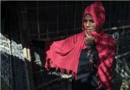  ??  ?? Rajuma, 20, a Rohingya refugee, at the Kutupalong refugee camp. She saw her 18-month-old son and most of the rest of her family killed by soldiers in Burma.