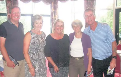  ??  ?? The lady captain with some of the winners on Lady Captain’s Day