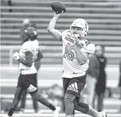  ?? AP PHOTO/BUTCH DILL ?? South quarterbac­k Gardner Minshew II of Washington State throws a pass Tuesday during practice for Saturday’s Senior Bowl in Mobile, Ala.