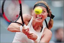  ?? FRANCISCO SECO/AP PHOTO ?? Petra Kvitova returns a ball from Kiki Bertens during the Madrid Open women’s final on Saturday. Kvitova won 7-6 (6), 4-6, 6-3.