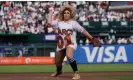  ?? Photograph: Jeff Chiu/AP ?? San Francisco drag laureate D'Arcy Drollinger throws out the first pitch as part of the San Francisco Giants' Pride Day.