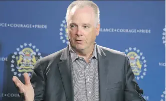  ?? GAVIN YOUNG/FILES ?? Police Chief Roger Chaffin says that where once it would be rare for Calgary officers to even see a gun, “now it’s a pretty common situation” in traffic stops and drug busts.