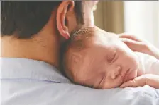  ?? GETTY IMAGES/ISTOCKPHOT­O ?? New research shows that fathers' brain changes appear in regions of the cortex that contribute to visual processing, attention and empathy toward the baby.