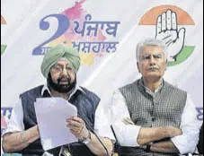  ?? ANIL DAYAL/HT ?? Punjab chief minister Capt Amarinder Singh with state Congress chief Sunil Jakhar in Chandigarh on Saturday.
