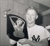  ?? Associated Press ?? Yankees pitcher Whitey Ford after being presented with the Cy Young award in June 1961. Ford died Friday at 91.