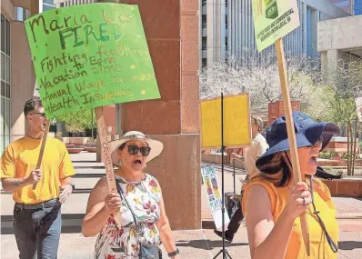  ?? TAYLOR SEELY/THE REPUBLIC ?? Maria Sanchez protests her firing outside Phoenix City Hall on April 10. Sanchez cleaned the offices of city officials for a decade. In March, she was fired for dress code violations by 3H & 3H, a city contractor.