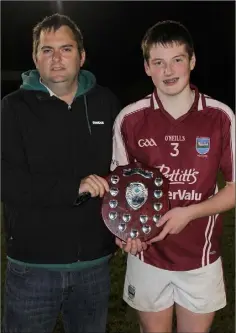  ??  ?? Dean Goodison of People Newspapers (sponsors) with St. Martin’s captain John Codd.