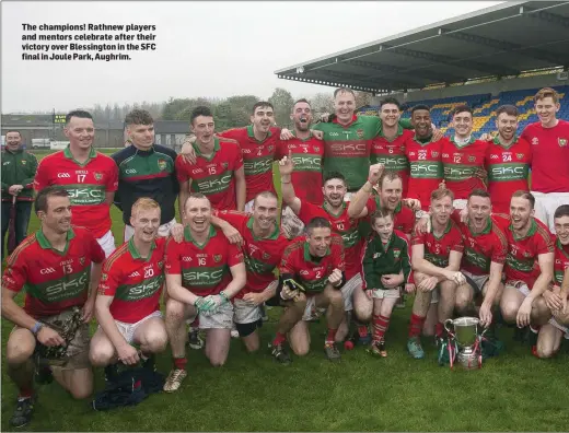  ??  ?? The champions! Rathnew players and mentors celebrate after their victory over Blessingto­n in the SFC final in Joule Park, Aughrim.