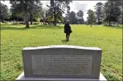  ?? HYOSUB SHIN / HSHIN@AJC.COM ?? Fred Smith, co-chair of Athens Black History Bowl Committee, stands in Oconee Hill Cemetery on the University of Georgia campus where the remains were re-interred.