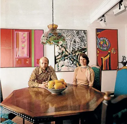  ?? SUPPLIED ?? Warwick and Kitty Brown, with paintings by Don Driver, Robert Ellis and David Armitage, 1978.