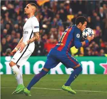  ?? Rex Features ?? Neymar grabs the ball after finding the net during Barcelona’s incredible Champions League Round of 16 comeback against PSG at the Camp Nou earlier this year.