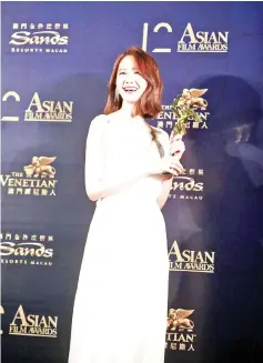  ??  ?? South Korean singer-actress Yoona wins the Next Generation award.