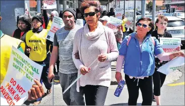  ?? Picture: Phando Jikelo/ANA ?? INDEPENDEN­CE: About 70 people from the Cape Society for the Blind celebrated the tool of independen­ce for the blind or visually impaired yesterday, commemorat­ing White Cane Safety Day with a walk in Main Road, Salt River. Taking the lead in the walk is...