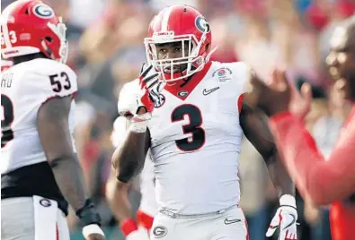  ?? JOSHUA L. JONES/AP ?? Drafting Georgia linebacker Roquan Smith (3) with the 11th pick would go a long way to shore up a group that allowed too many tight ends to gain big chunks of yards against the Dolphins in 2017.