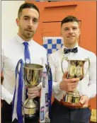  ??  ?? Knocknagre­e captain Matthew Dilworth and Kanturk Hurling captain Lorcan O’Neill with their All-Ireland cups.