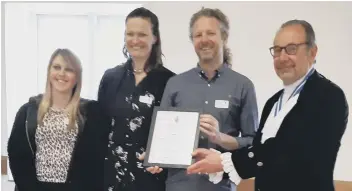  ?? ?? Neal Allistone, Alice Field and Laura Bothwell from thechildre­n’s charity Spurgeons receiving their award