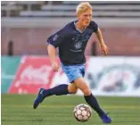  ?? STAFF PHOTO BY C.B. SCHMELTER ?? Chattanoog­a FC’s Caleb Cole pushes the ball down the field in Saturday night’s game at Finley Stadium.