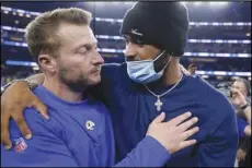  ?? Associated Press ?? Rams head coach Sean McVay (left) celebrates with Robert Woods after the NFC Championsh­ip game against the San Francisco 49ers on Sunday in Inglewood. The Rams won 20-17 to advance to the Super Bowl.