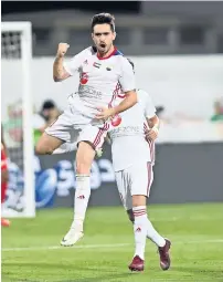  ?? Photo AGL ?? Sharjah players celebrate a goal against Shabab Al Ahli during the Arabian Gulf League match on Thursday. —