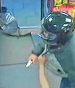  ??  ?? CCTV of the robbery at the Chartham Premier Express