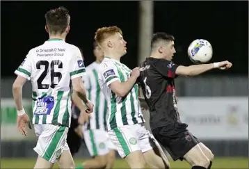  ??  ?? Conor Crowley hasn’t much room to manoeuvre as Cian Maher and Darragh Lynch apply pressure.